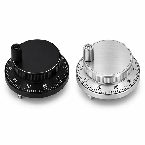 Black and silver CNC MPG handwheels viewed from above